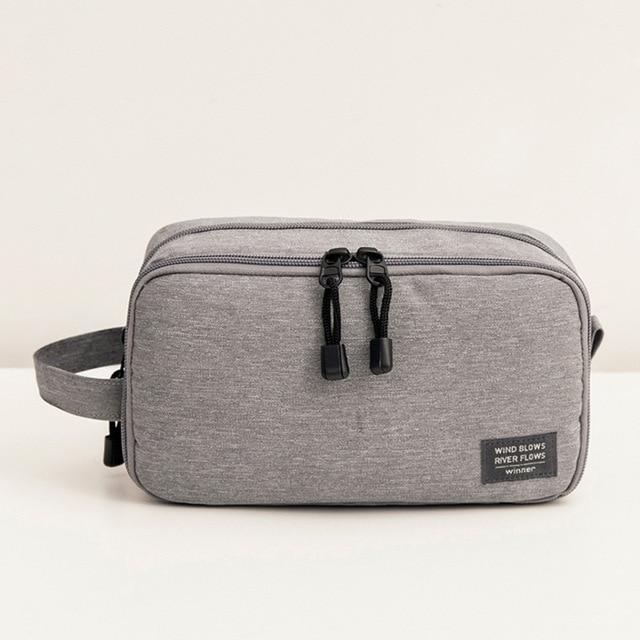 Trousse de toilette voyage étanche et pratique Gris