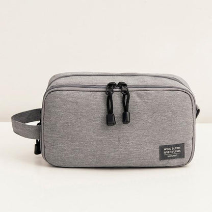 Trousse de toilette voyage étanche et pratique Gris